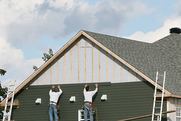 Professional Siding Contractor technician working in Harrison, NY